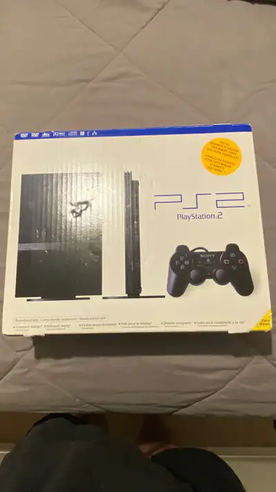 Complete slim model PS2 with 2 controllers and memory card., View more
