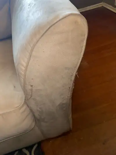 Free couch It’s too big for my home, you can have it. What’s wrong with it? It is missing the feet…...