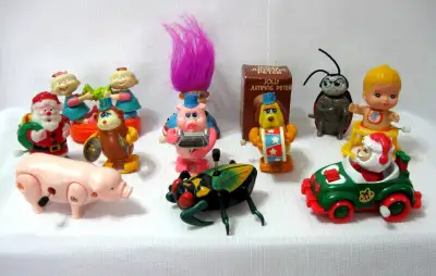 LOT OF TWELVE PLASTIC WIND-UP TOYS c.1990s, View more