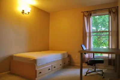 Sept 1: Large furnished room, utilities included, AC, all Female