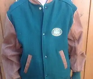 Two Niagara Casino coats, like new. Heavy wool blend body (green), Leather sleeves, collar and pocke...