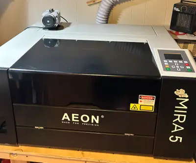 Downsizing! Gently used Mira 5 laser cutter/engraver – $4,500, View more