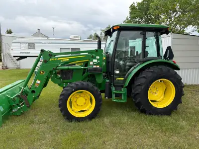 1031 hours, self leveling loader, and 3 point hitch.