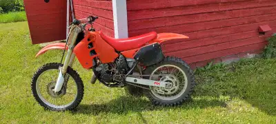 Rides nice Tires ,resleaved and new pistons,rebuilt power valves and reeds brakes chain ,tires front...