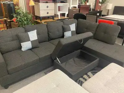 This sectional sofa offers both style and functionality for your living space. This comfy couch feat...