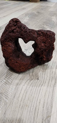 Lava rock with heart shape hole