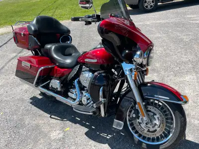 2012 Harley Electra glide ultra limited, mostly stock and well loved. Has some sun fading on the das...