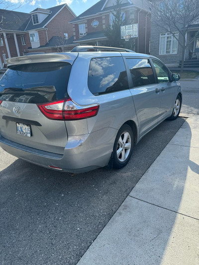 Selling silver Toyota Sienna 