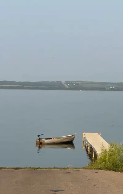 Great fishing boat no cracks or leaks inside all box lined and a platform for fishing comes with tra...