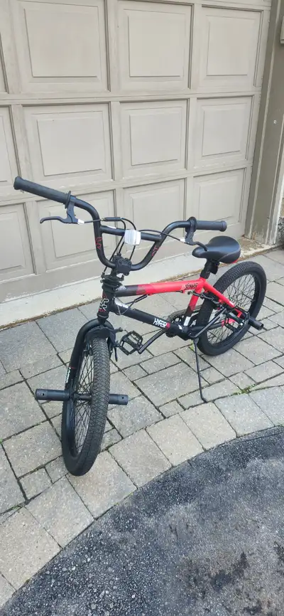 A 20 inches wheel bike (red and black), View more