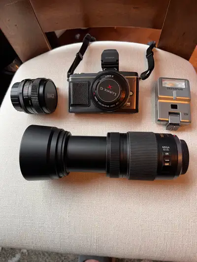 New Condition Olympus EP-2 12.3MP Micro Four Thirds interchangeable lens digital camera Panasonic Lu...