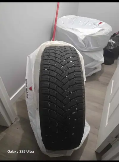 I’m selling a Michelin X ice snow tire that’s practically brand new. Tire size 235/60R18 Tubeless St...