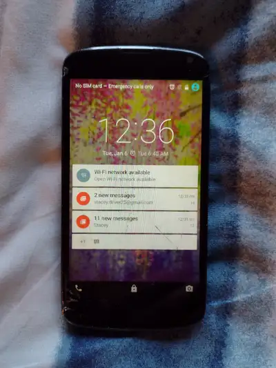 Needs a new screen, lights on but no touch controls, no charger or cord, takes USB micro plug in $5