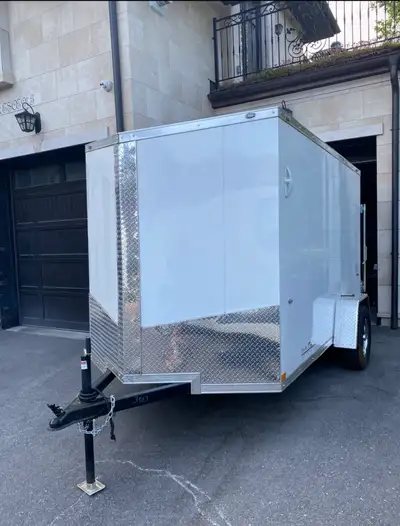 Miska 6x10 enclosed trailer, ready for your hauling needs! It's perfect for everything from moving e...