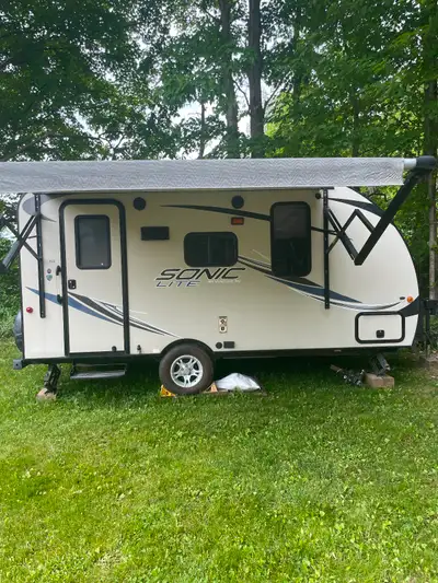 Selling our Sonic Lite 150 travel trailer. Amazing condition. Power awning. Blue Ox hitch and sway b...