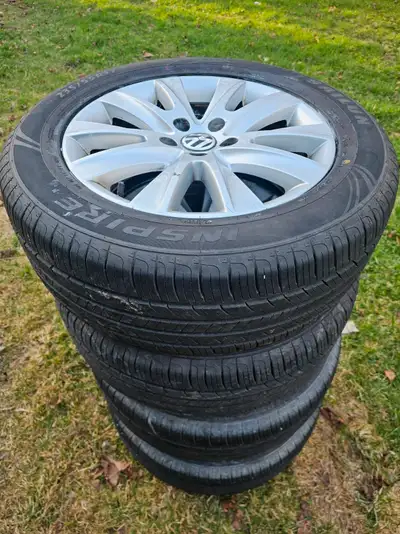 Selling a set of VW Tiguan all season tires and alloy rims, the two-year old Sailun tires are like n...