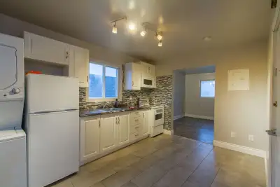 Bright and renovated 1 bedroom + den/office apartment located on the 2nd floor of a quiet 2-storey t...