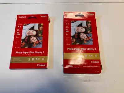 Canon Photo plus paper for 4x6 pics. Have one opened package and 11 int he other for a total of 31 p...