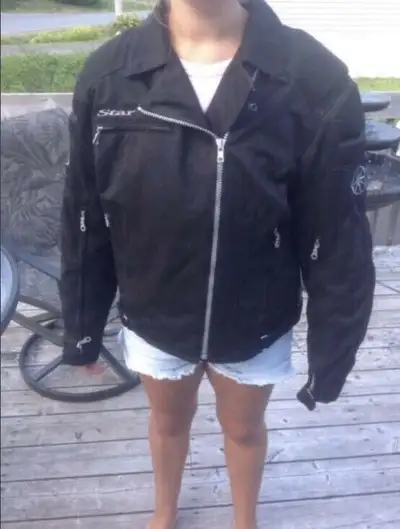 Yamaha motorcycle jacket.size ladies large.padded elbows and shoulders.excellent condition. Call 902...