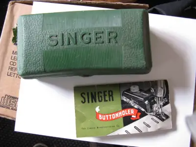 Vintage Singer machine for sewing buttonholes, from the 1960s. Comes complete with case, all parts a...