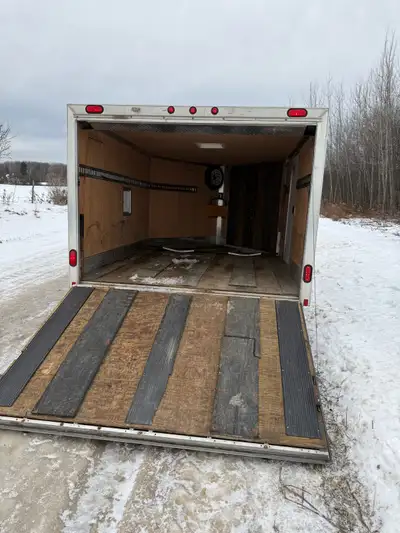 Blizzard v nose drive in drive out aluminum snowmobile trailer Trailer has 1 fuel door 1 man door 1...