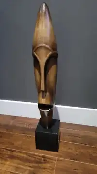 Wooden 31" tall face sculpture bought at Structube
