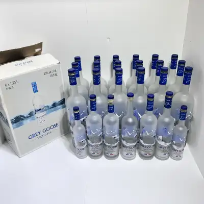 I'm selling a collection of Grey Goose empty bottles, including a few 1.75L bottles and some smaller...