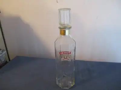 A very collectible empty liquor bottle by SMIRNOFF, this vintage VODKA bottle is a a750 Ml. bottle &...