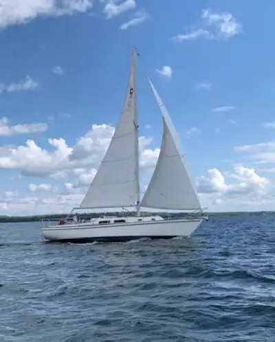This classic Pearson 35 sailboat shows her strikingly beautiful lines as she cuts through the water...