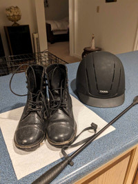 Helmet , riding boots and a whip for sale 100.00 for all .