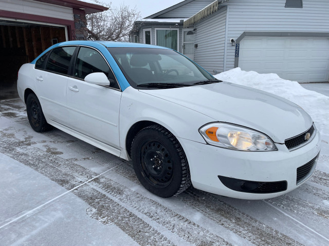 2011 Impala two sets of tires in Cars & Trucks in Red Deer
