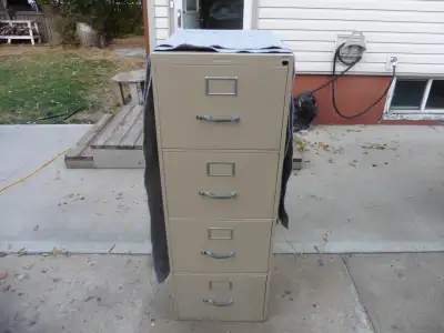 I want it gone. You won't get a better deal than this. 4 Drawer Legal Size Filing Cabinet W-18", D-2...