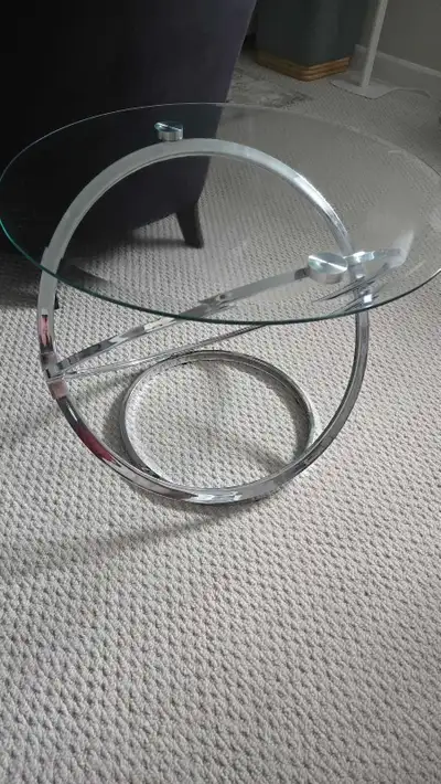 2 glass/chrome end tables, View more