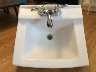 Purchased at Restore and no longer have plans to use. American Standard brand wall mount sink with f...