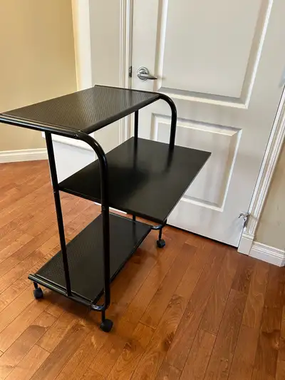 Black, metal computer desk with elevated ergonomic monitor stand, View more