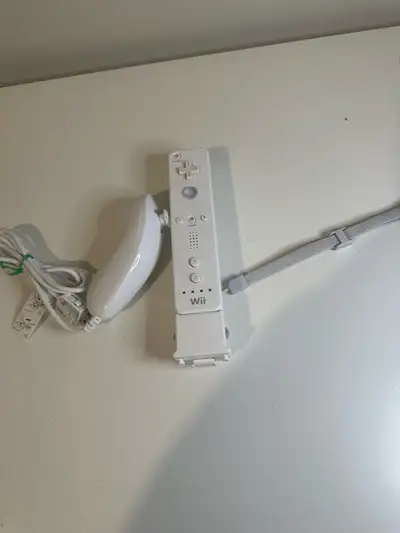 Controllers new! Selling a Nintendo Wii Remote with Nunchuk. Plus Wii board.
