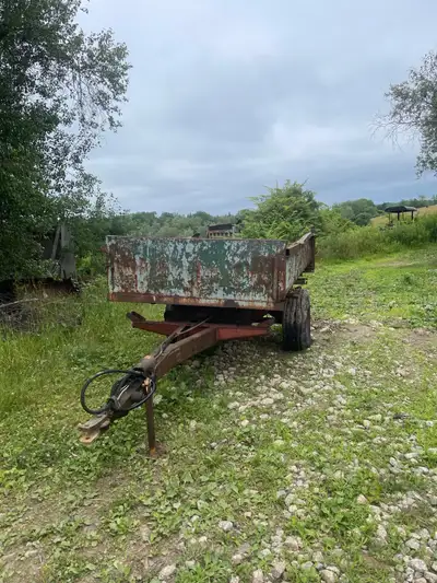 Farm equipment dump trailer that hooks into your tractors hydraulics will get measurements soon $800...