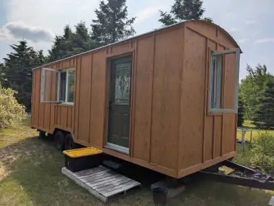 One of a kind, bunkie built on a trailer !!! The frame is repurposed from a travel trailer; sanded d...