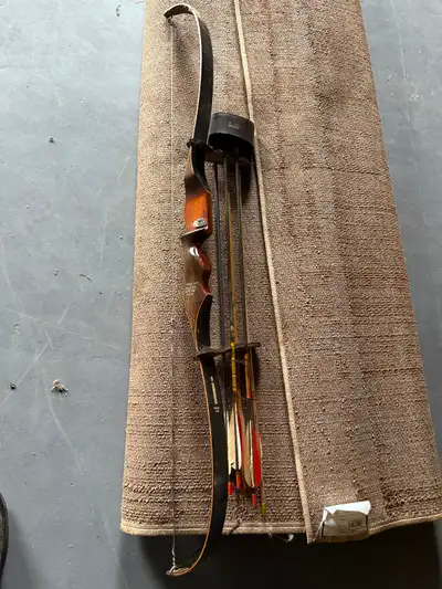 Ben Pearson bow with arrows