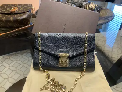 Louis Vuitton saint germain Empreinte pochette, View more