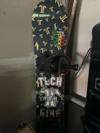tech nine rare snowboard with flow step-in bindings, View more