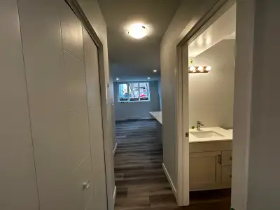 Basement* Suite features a private side entrance leading to a 2 bed, 1 bath unit. Amazing rental loc...