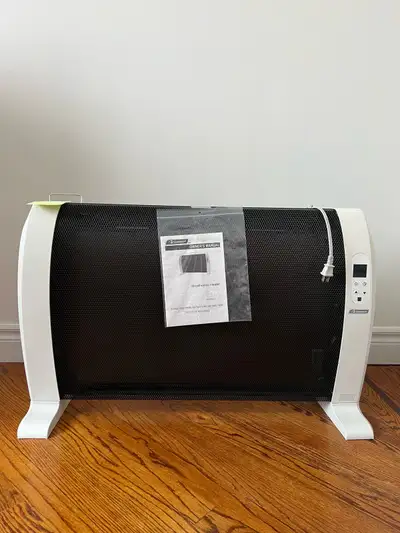 Stay warm and cozy with this Garrison Mica Thermic Heater! This unit is in good condition and ready...