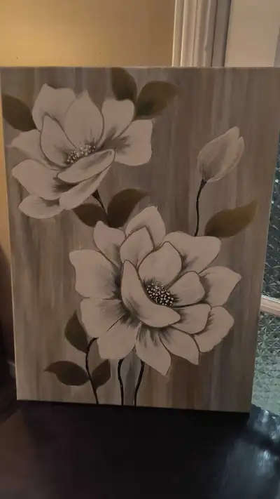 Add a touch of elegance to your living space with this floral painting. Its neutral colour pallete m...