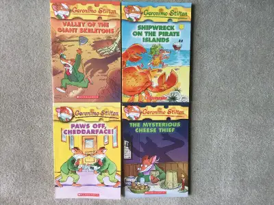 BRAND NEW GERONIMO STILTON BOOKS. 4 TITLES INCLUDE: PAWS OFF, CHEDDARFACE! THE MYSTERIOUS CHEESE THI...