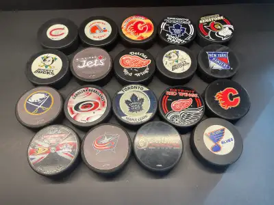 19 Team Hockey Pucks, View more