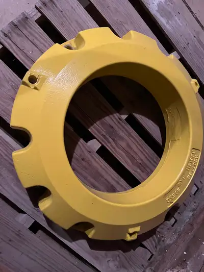 Pair of John Deere Wheel Weights 452 Lb each, 3 bolt hole spacing 22” apart. Save $1000 if bought th...