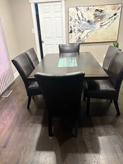 Mobilia wooden dining room table and 6 leather chairs, View more