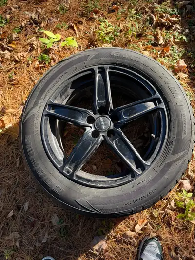 These winter tires, specifically Cooper 225/60R18, come mounted on stylish black alloy rims and were...