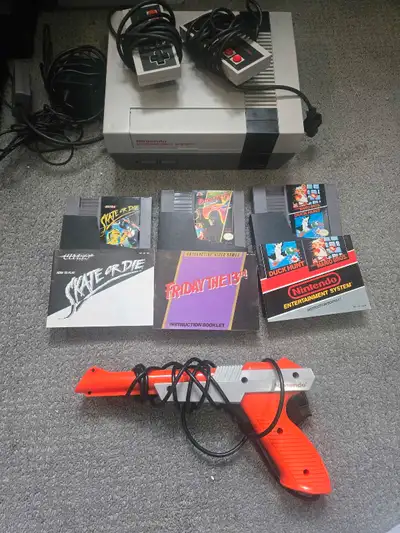 Nintendo nes + GAMES + ZAPPER + 2 CONTROLLERS, View more